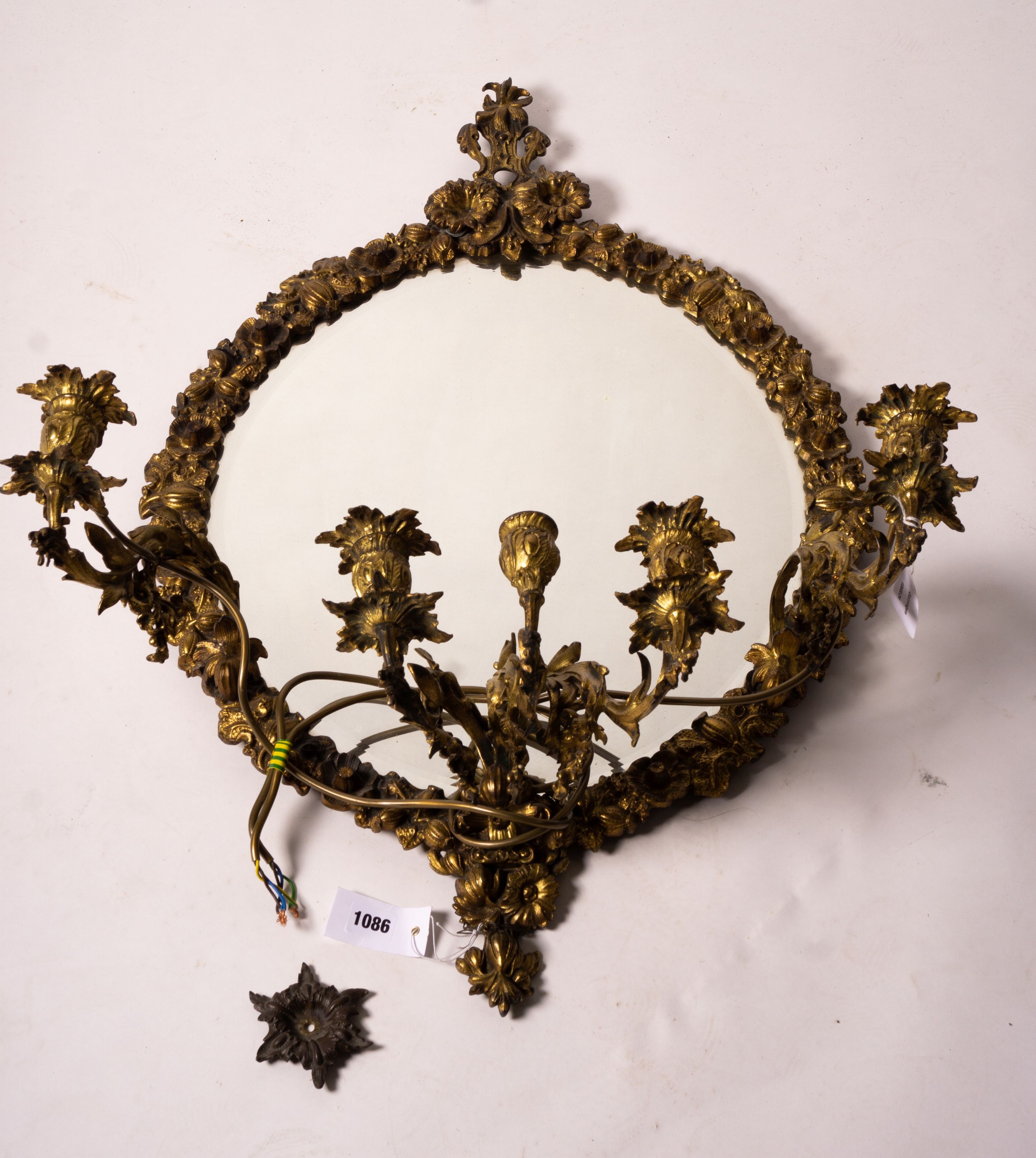 A late 19th century brass five branch girondole, width 64cm, height 84cm